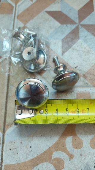 Tirador pomo