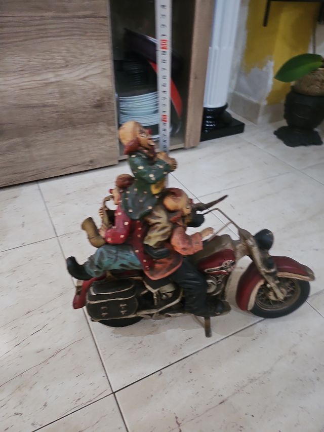 Moto de adorno