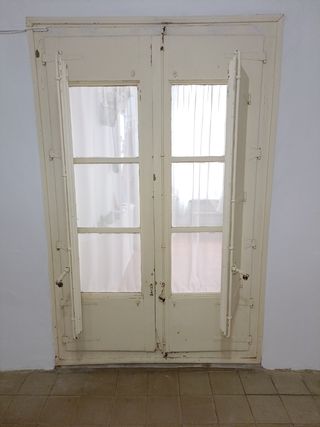 Puerta cristalera con contra ventanas