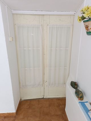 Puerta cristalera con contra ventanas