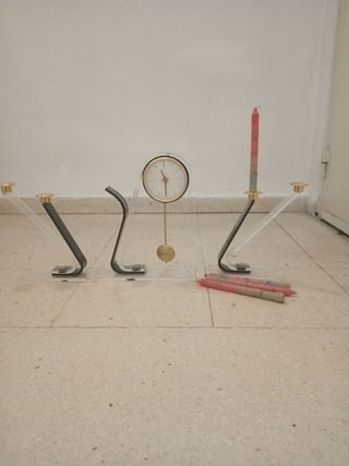 Conjunto de reloj y candelabros para velas