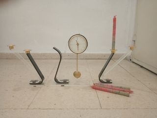 Conjunto de reloj y candelabros para velas