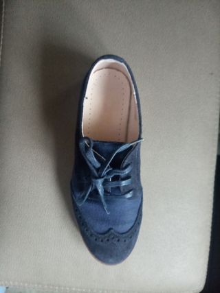 Zapatos de comunión,Tizzas