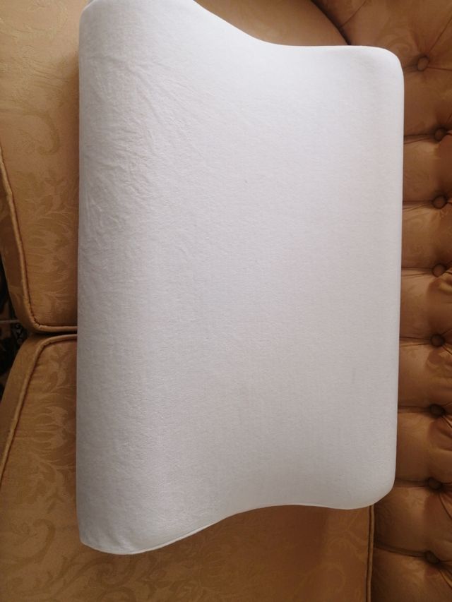 Cuscino cervicale ergonomico