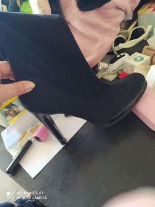 Botas por debajo del muslo