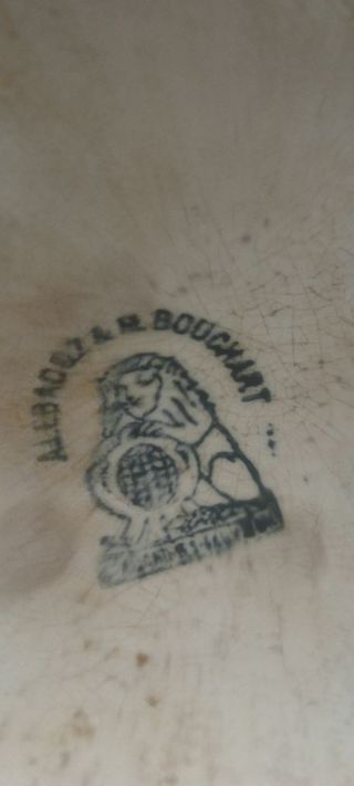 Plato de cerámica muy antiguo firmado