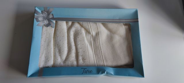 Arrullo para bebé color crudo