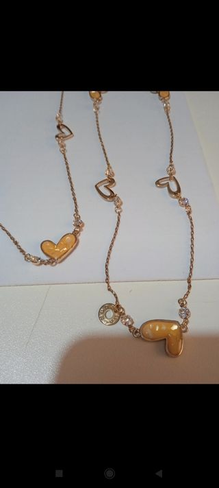 Collana lunga colore oro con cuori smaltati donna