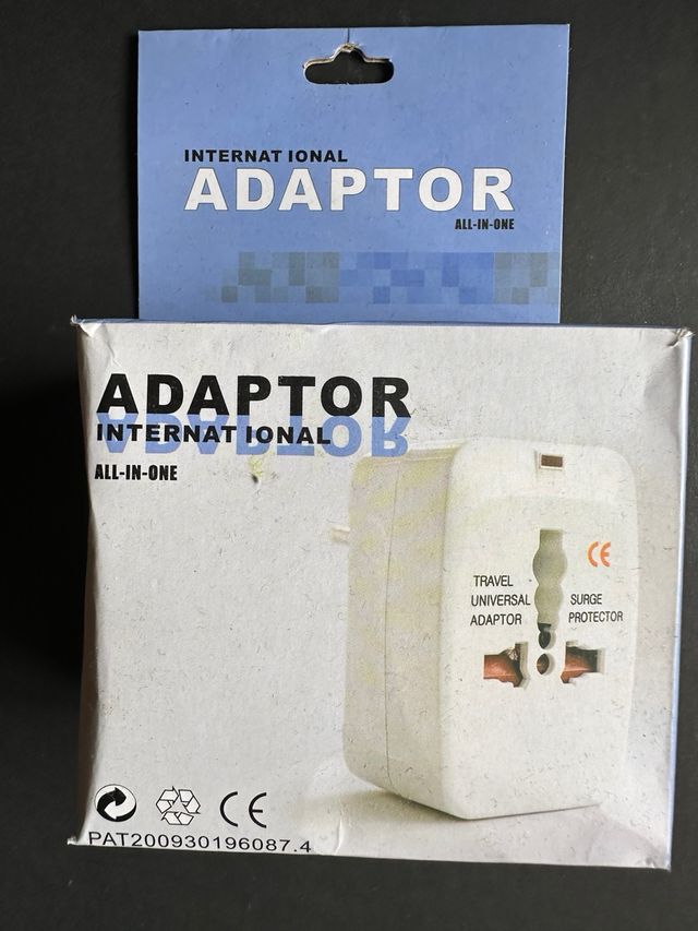 Cargador de viaje todos paises en su caja