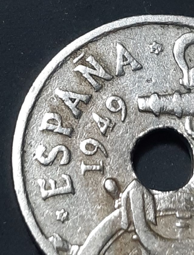 Moneda 50 céntimos flechas invertidas