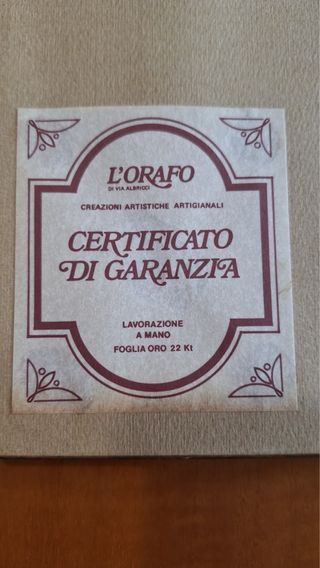 Quadretti su foglia oro