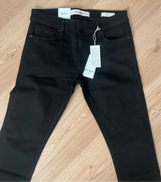 Pantalones Guess vaqueros con etiquetas