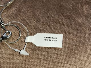 Colgante, brazalete y anillo ojo de gato