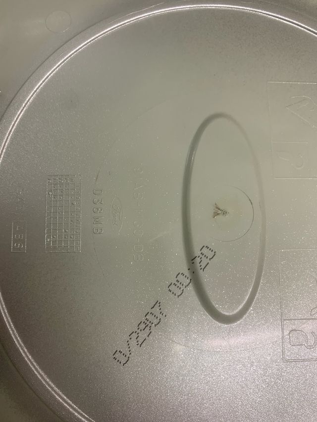 Tapacubo ford Escort Cabrio 90/95