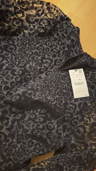 Blusa semitransparente animal print