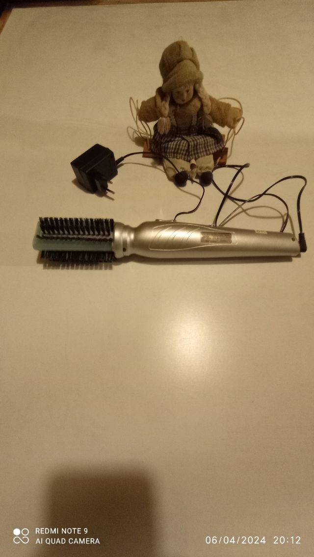 Escova de cabelo elétrica