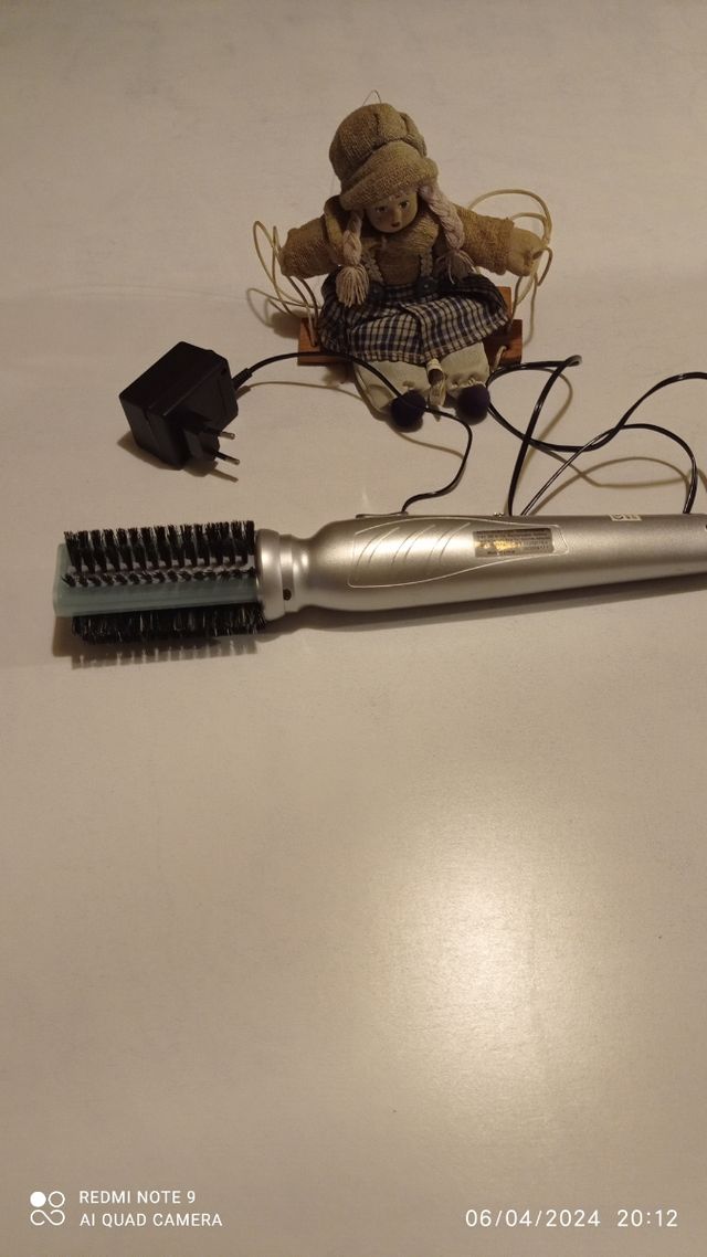 Escova de cabelo elétrica