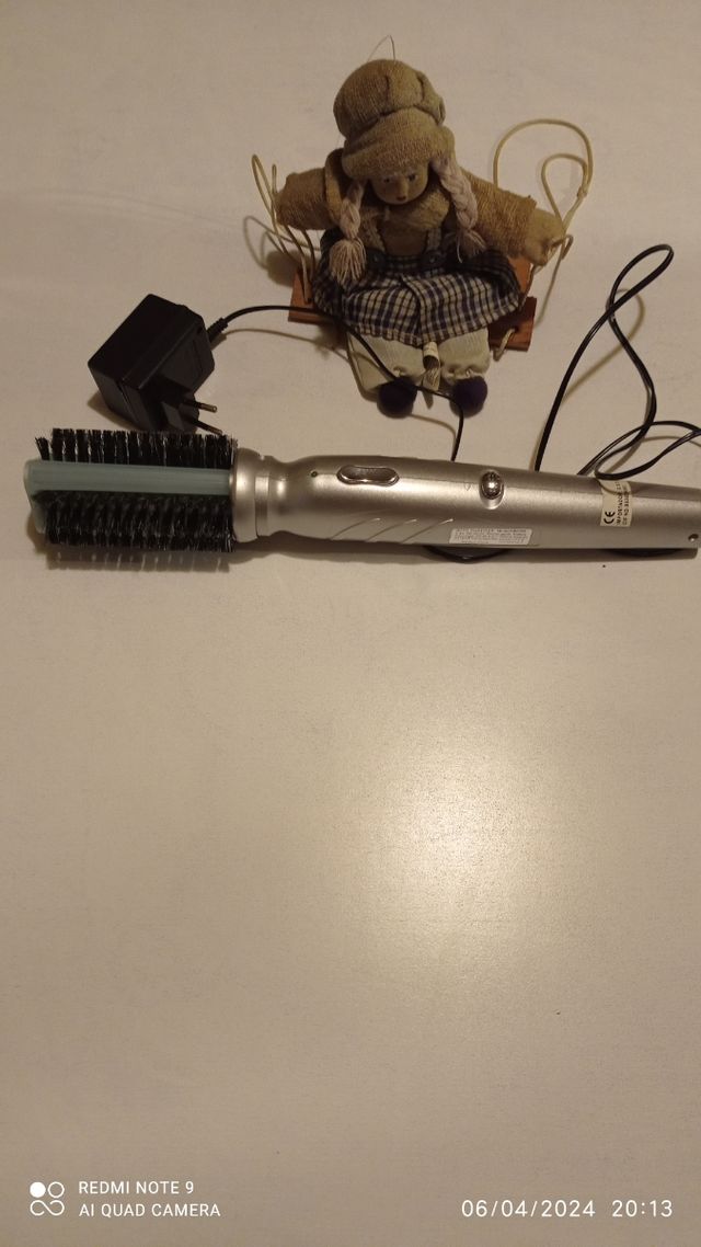 Escova de cabelo elétrica