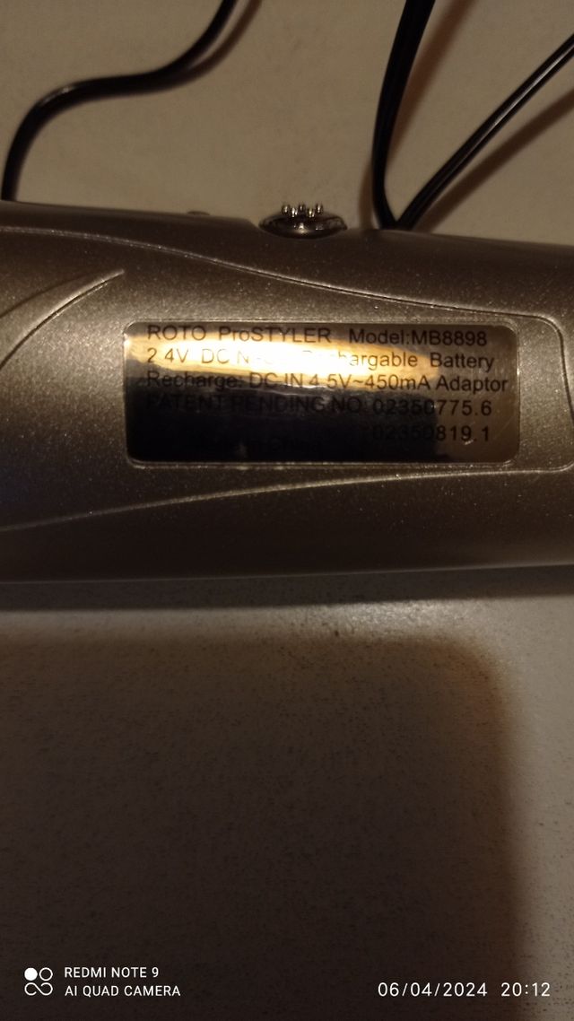 Escova de cabelo elétrica