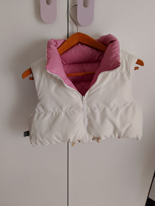 Piumino smanicato corto donna