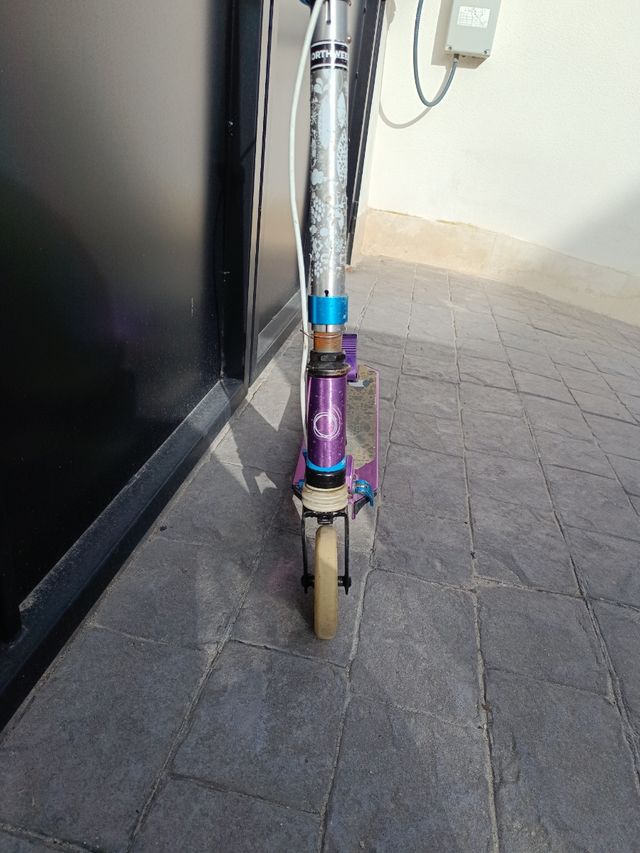 Patinete oxelo morado