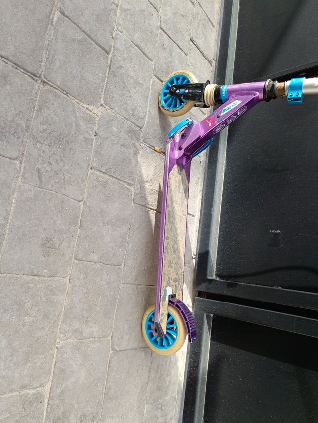 Patinete oxelo morado