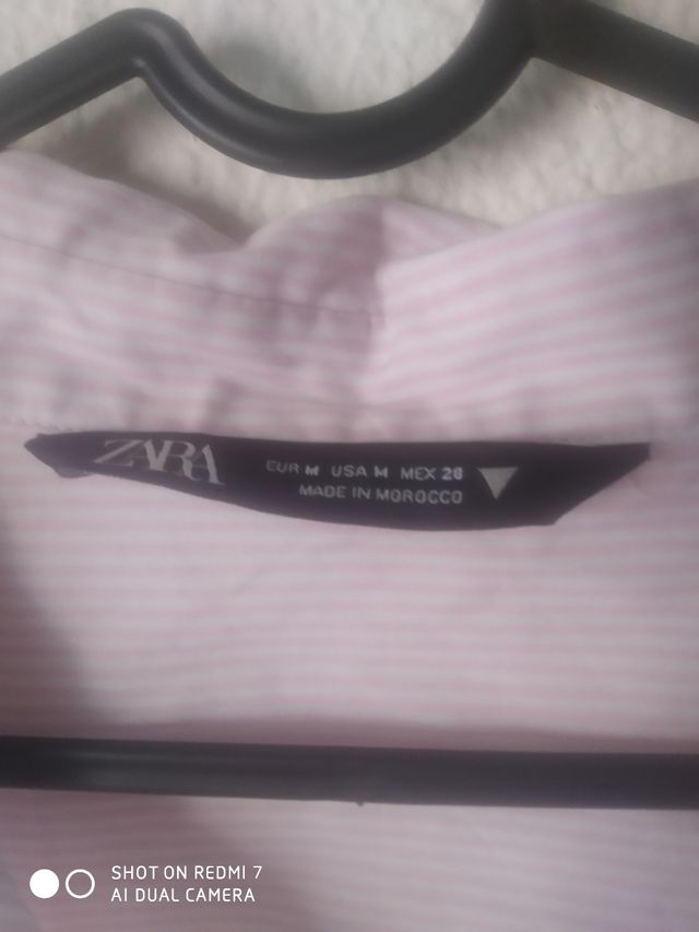 Camisa rosa y blanca corta