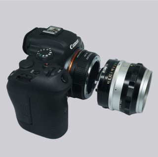 Adaptador NUEVO montura de Nikon a Canon
