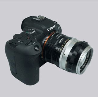 Adaptador NUEVO montura de Nikon a Canon