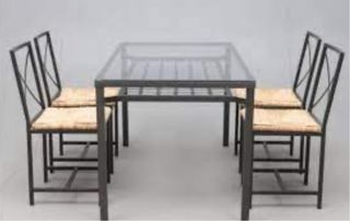 Mesa cristal y forja con cuatro sillas ikea