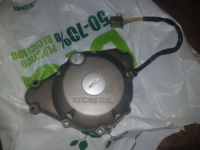 Tapa y alternador cbr125r 2005