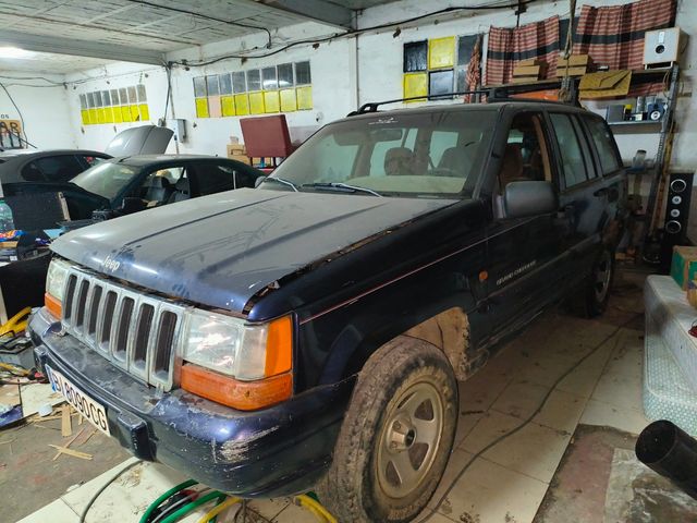 Jeep Cherokee 1997 o cambio por moto de monte