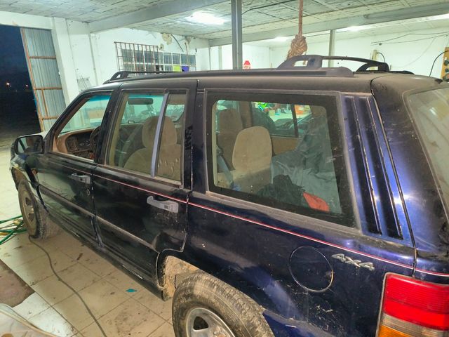 Jeep Cherokee 1997 o cambio por moto de monte