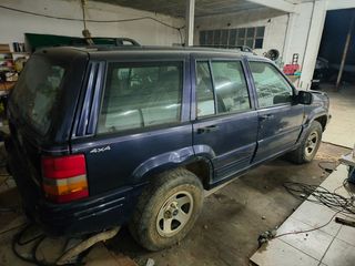 Jeep Cherokee 1997 o cambio por moto de monte