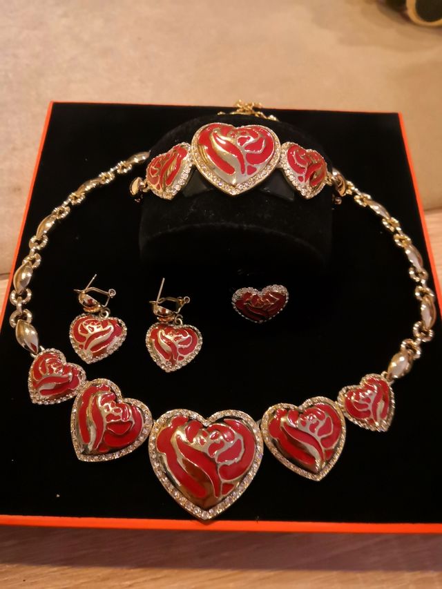 Set collana braccialetto orecchini