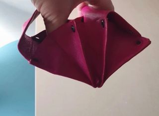 Monedero rosa de cuero