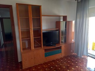 Mueble de salón con vitrinas de cristal