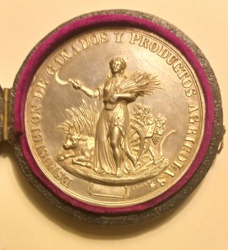 Moneda conmemorativa. Expos ganadera y agrícola