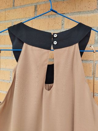 Blusa marrón y negro