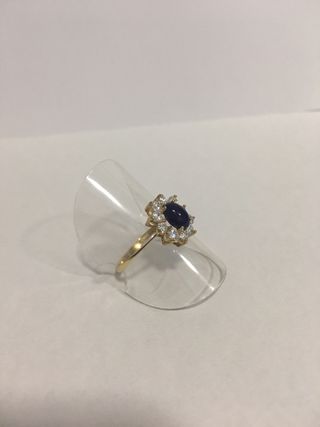 Anillo oro con zafiro cabujon