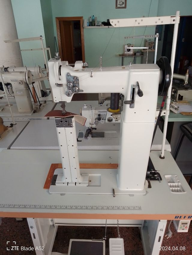 Maquina de dos agujas triple arrastre