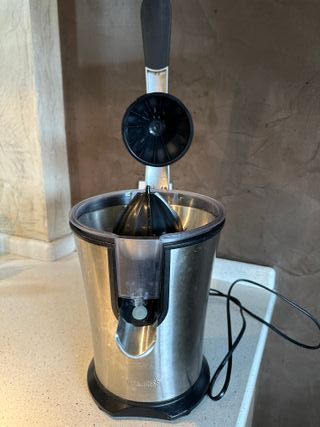 Exprimidor de acero inoxidable