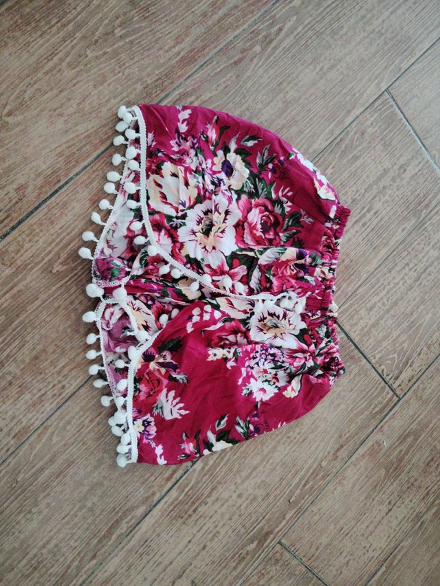 Pantalón corto estampado flores