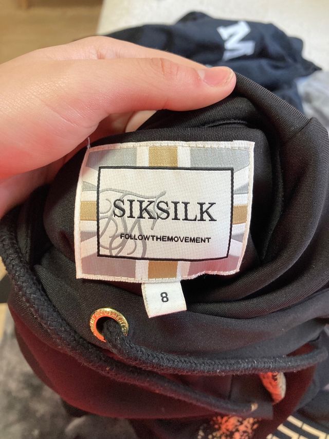 Conjunto SikSilk negro y dorado original talla xs