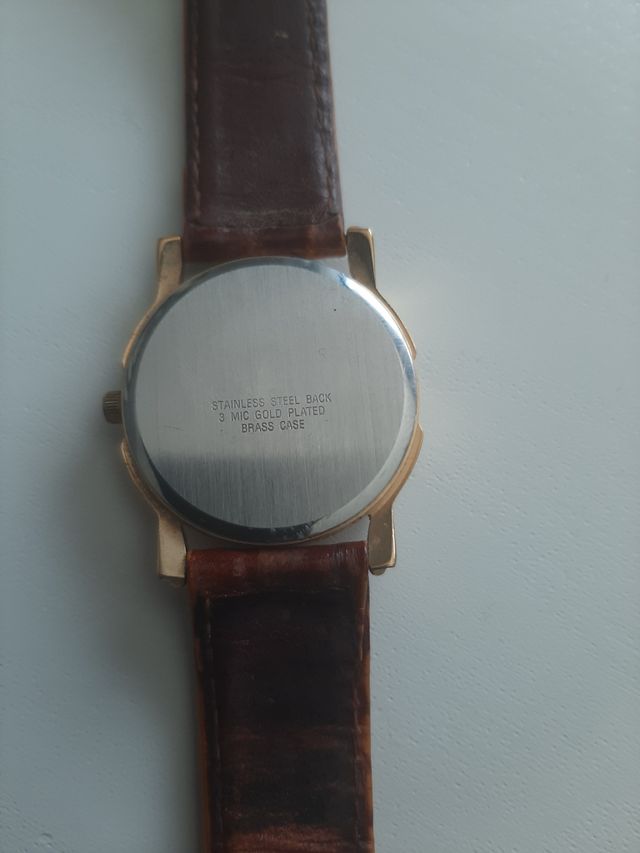 Reloj telemadrid bañado en oro