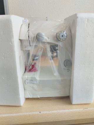 Maquina de coser portátil