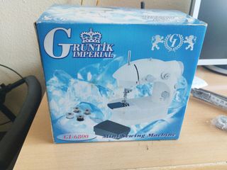 Maquina de coser portátil