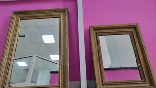 Pareja de espejos en dorado