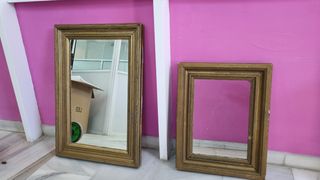 Pareja de espejos en dorado