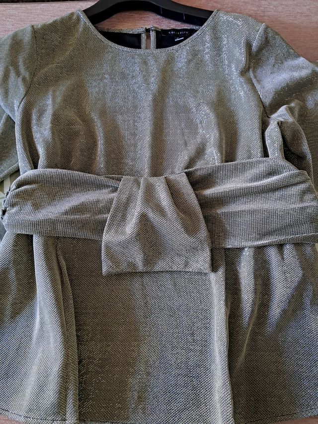 Blusa metalizada Cortefiel